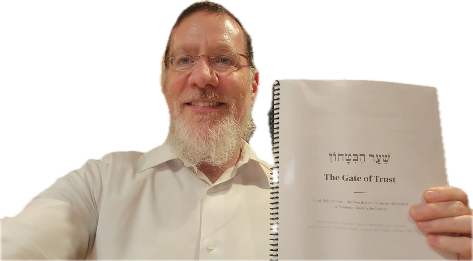 Rabbi Avraham Zajac holding up the printed Shaar HaBitachon — The Gate of Trust — produced from his shiurim